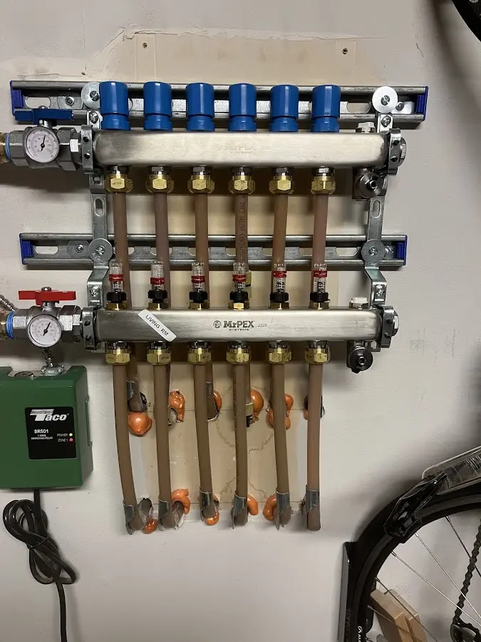 Plumber performing Leak Detection at a residential property in Northville